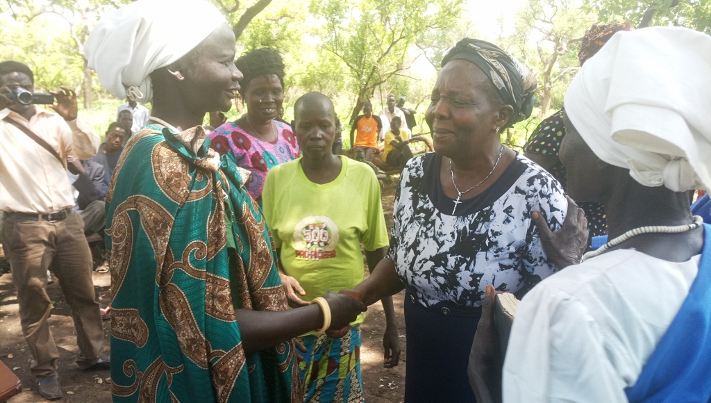 A member of ARLPIs board mrs Simporoza Otim interacts with women in south sudan